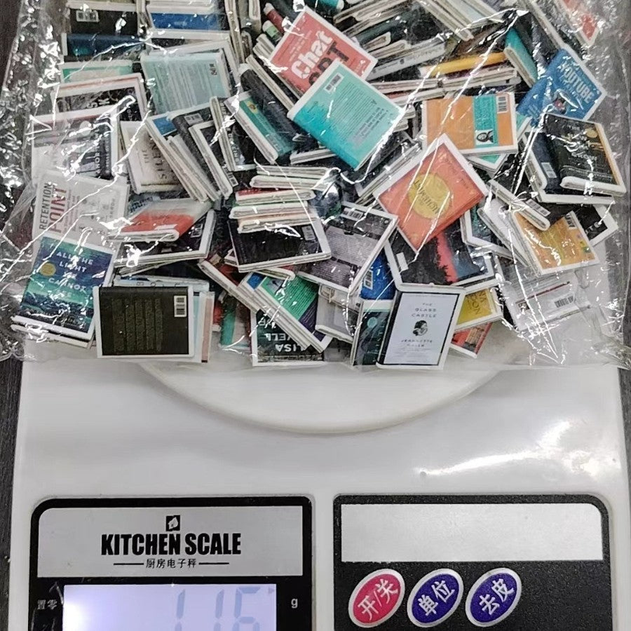 Miniature Anxiety Bookcase – An antique-style bookstore with tiny books