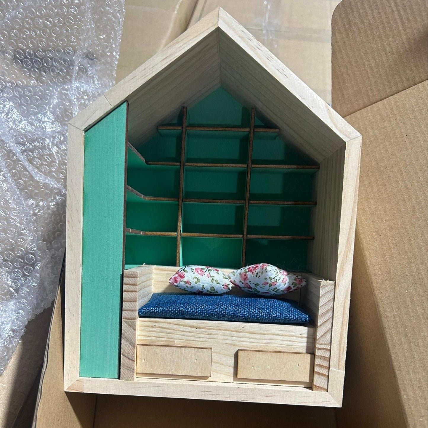 Miniature Anxiety Bookcase – An antique-style bookstore with tiny books