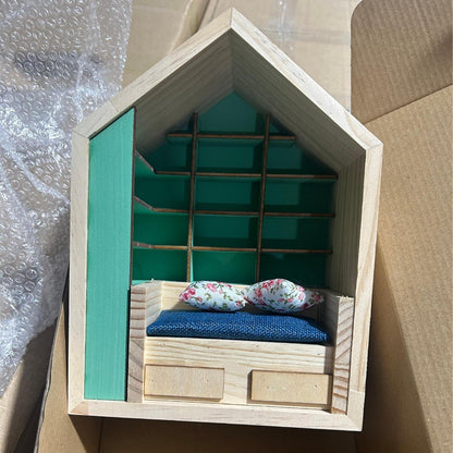 Miniature Anxiety Bookcase – An antique-style bookstore with tiny books