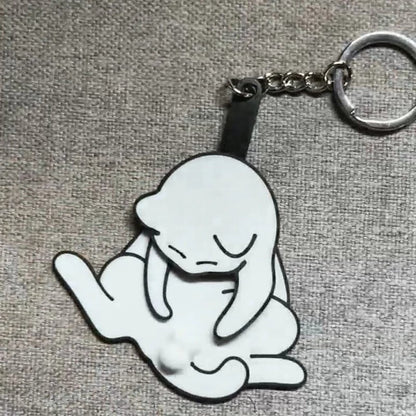 Playing with eggs and kitten keychain