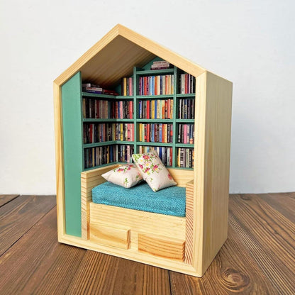 Miniature Anxiety Bookcase – An antique-style bookstore with tiny books