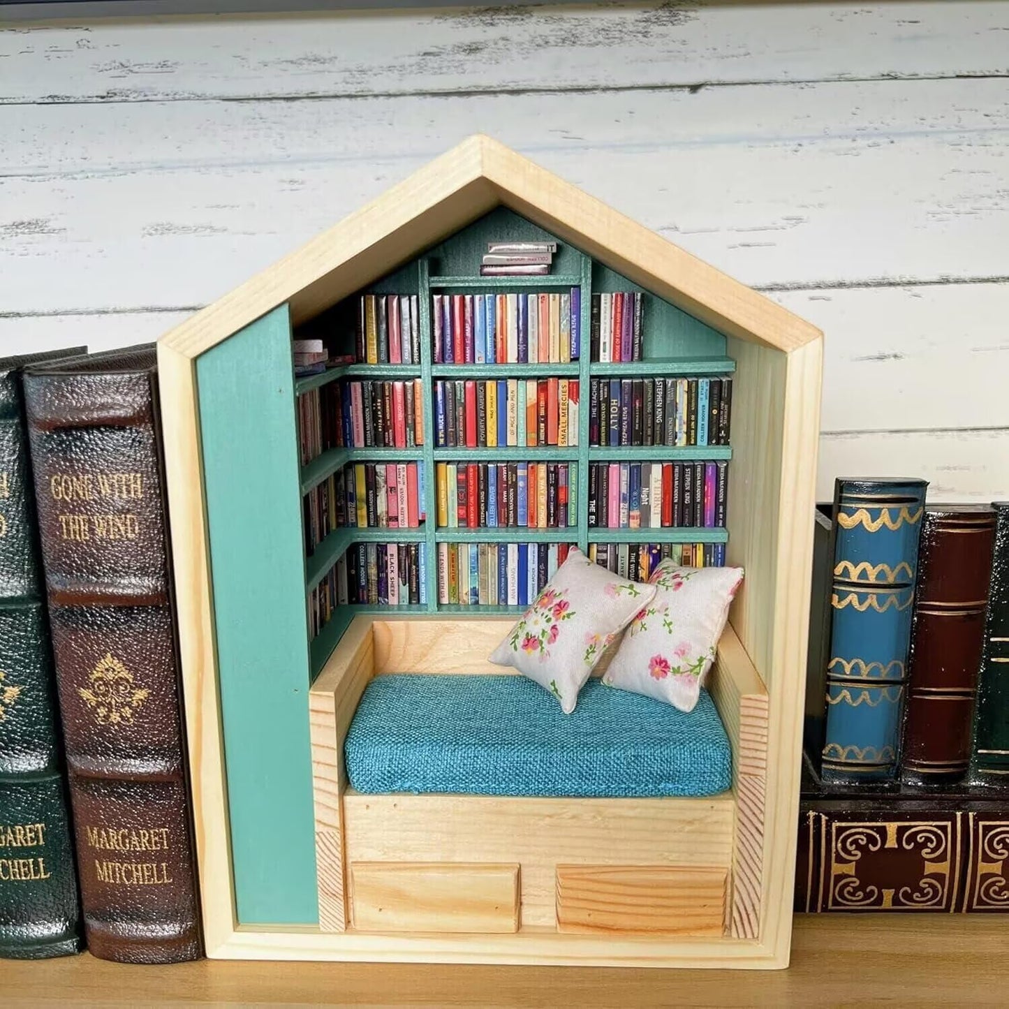 Miniature Anxiety Bookcase – An antique-style bookstore with tiny books